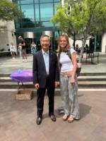 picture of me standing with president of my college